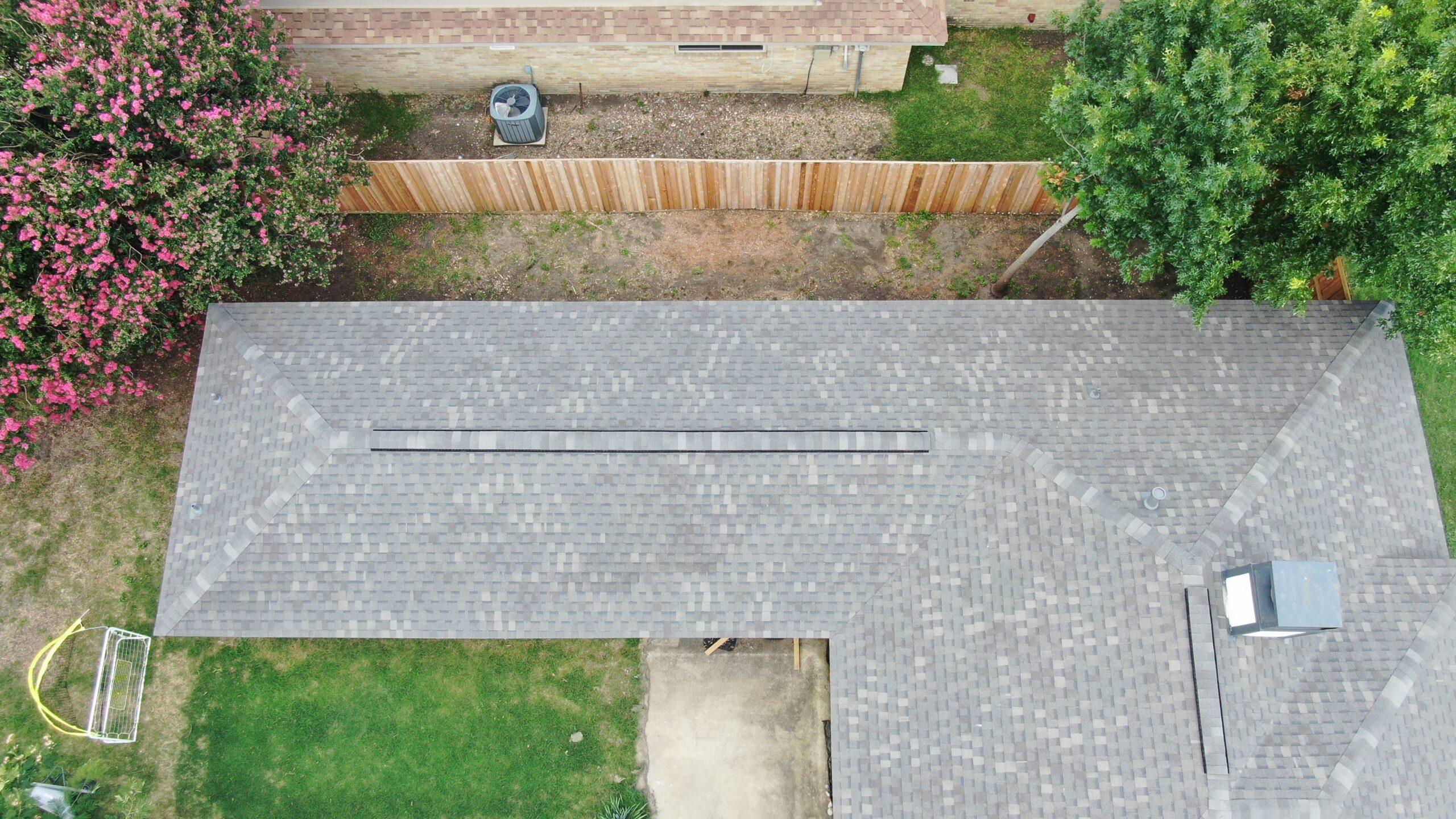 Aerial drone view of a completed roof by Concord Roofing & Construction